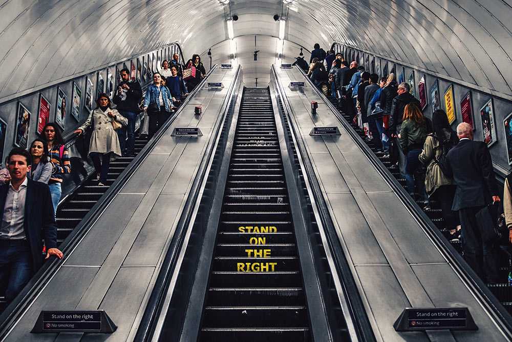 Line of people waiting on stairs Queue of People